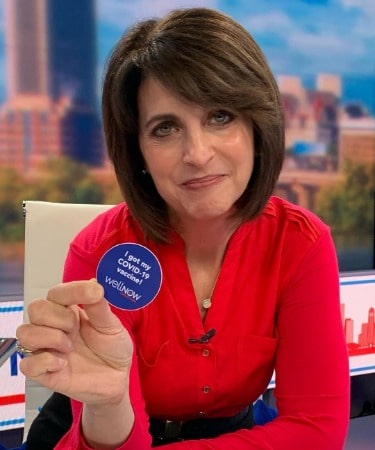 Christina Arangio is showing that she got the vaccine of COVID-19.